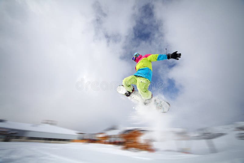 Snowboarder tail grab