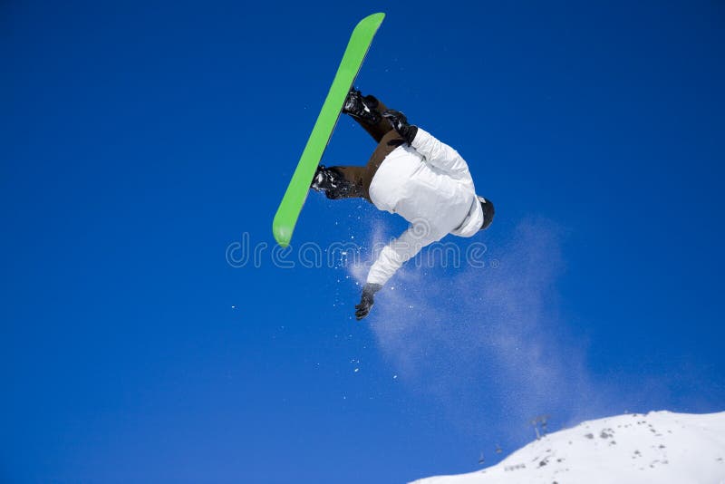 Snowboarder taking big air jump