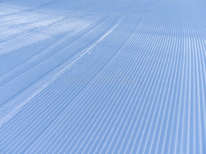 Snowcat Tracks In The Snow. Stripes Form An Amazing Snow Texture Stock ...
