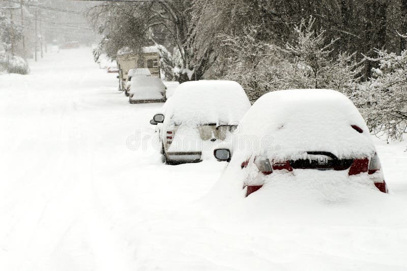 These are cars that were snowed in for a while during a snow storm in Oregon.