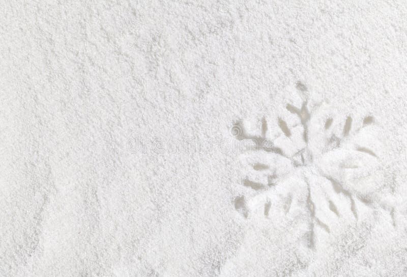 Snowflake in snow