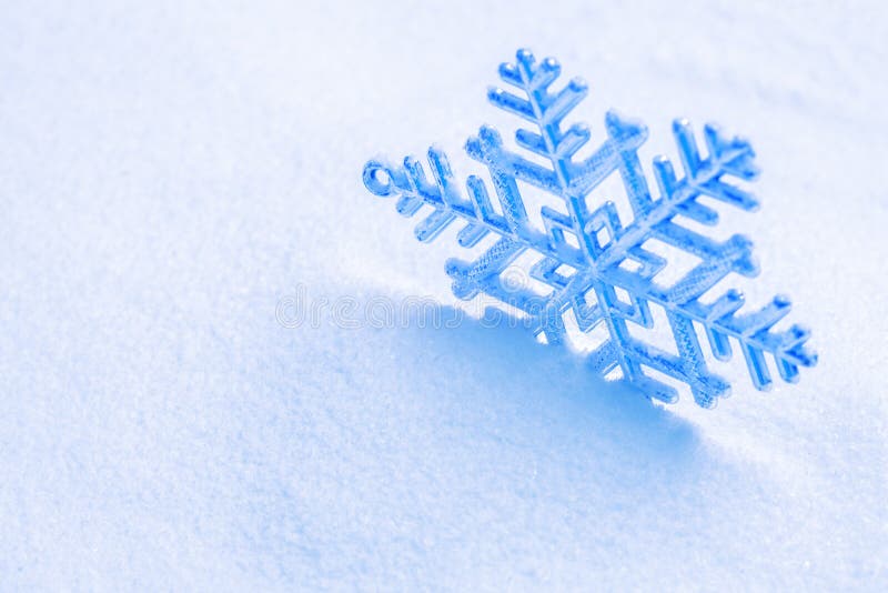 Snowflake on the snow. stock photography