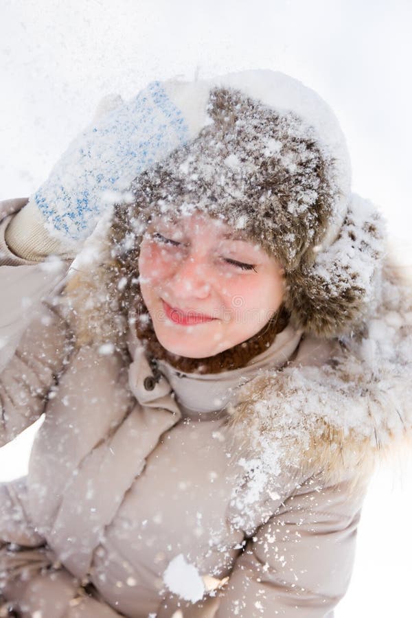 Snowing girl royalty free stock photos