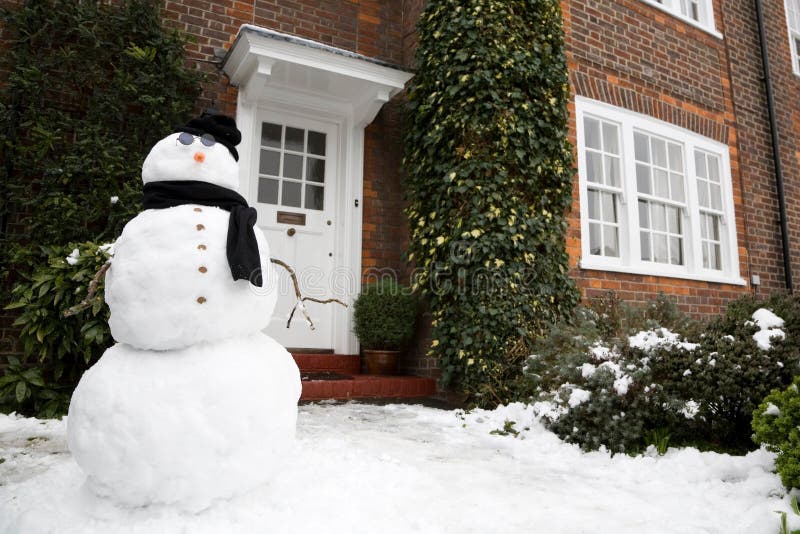 Snowman and house