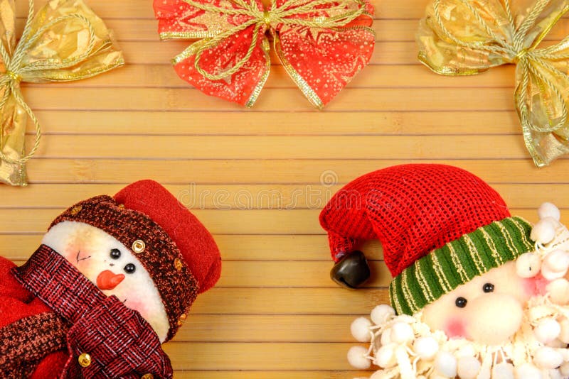 Snowman and Santa on a wooden background royalty free stock photo Snowman and Santa on a wooden background royalty free stock photo