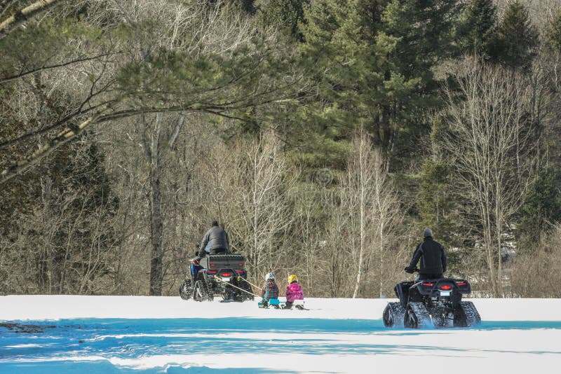 Snowmobil in the woods stock photography