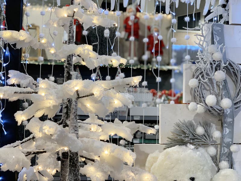 Snowy Christmas tree and glowing garlands royalty free stock image Snowy Christmas tree and glowing garlands royalty free stock image