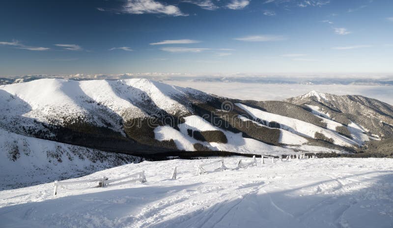 Snowy hill in mountains. Low Tatras, Slovakia