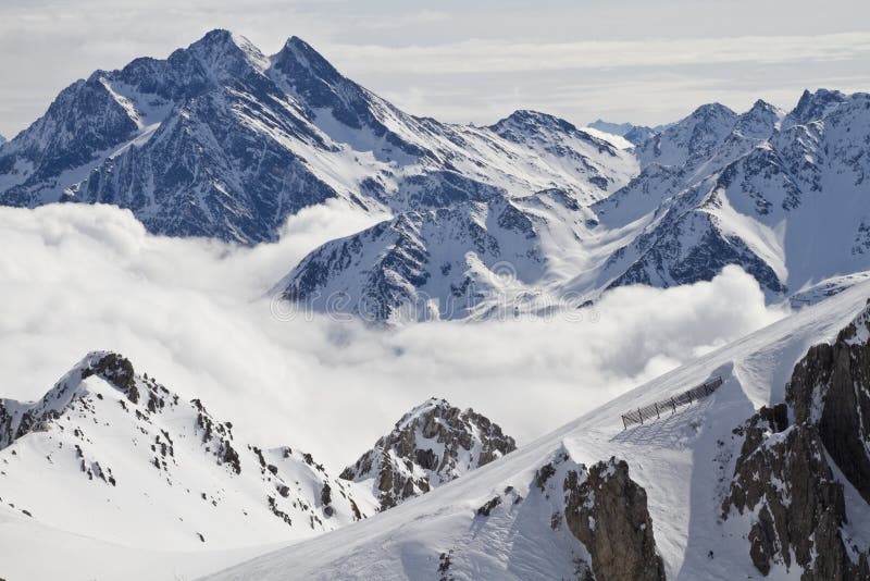 Snowy mountain peaks stock photo. Image of glacier, alps - 13615644