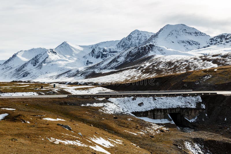 Snowy mountain peaks on the Ala Bel pass, Bishke-Osh highway