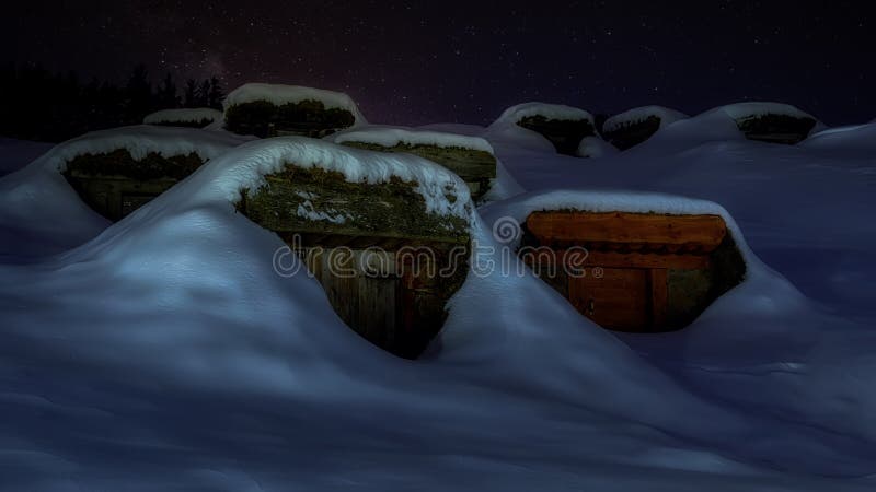 Snowy old potato cellar at night with stars