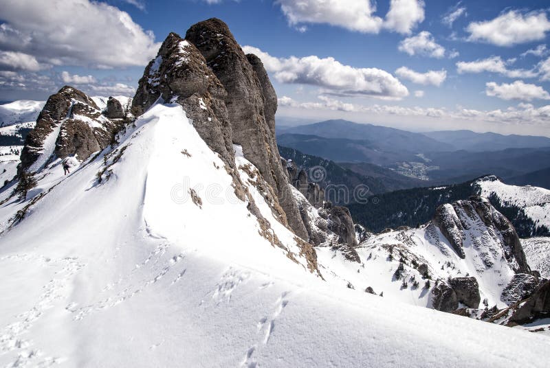 Snowy peaks of a mountain in winter