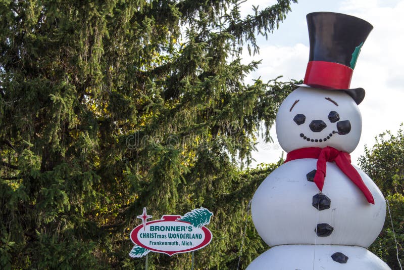 Frankenmuth, Michigan, USA - October 9, 2018: Giant snowman statue outside of Bronner`s Christmas Wonderland in Frankenmuth. Bronner`s bills itself as the worlds largest Christmas store with over 2 million ornaments for sale. Frankenmuth, Michigan, USA - October 9, 2018: Giant snowman statue outside of Bronner`s Christmas Wonderland in Frankenmuth. Bronner`s bills itself as the worlds largest Christmas store with over 2 million ornaments for sale.