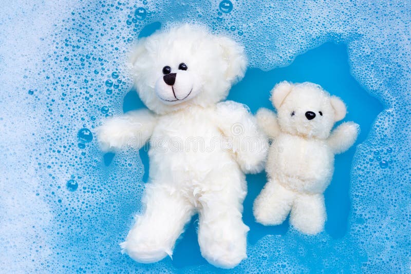 Soak Toy Bears In Laundry Detergent Water Dissolution Before Was Stock