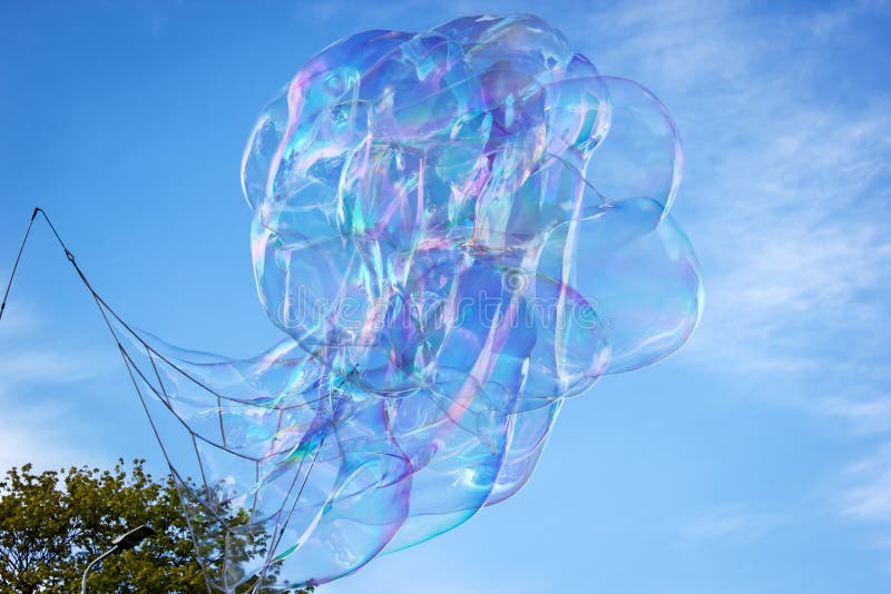 Soap bubble in the air with blue sky