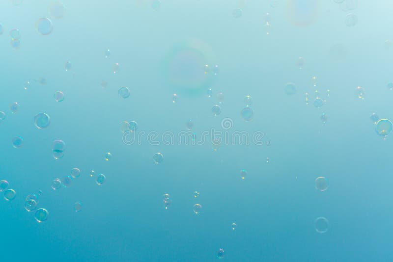 Soap bubbles with blue sky