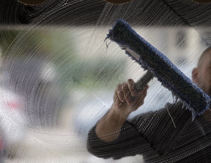 Steam Cleaning Windows with Pressure Editorial Photography - Image