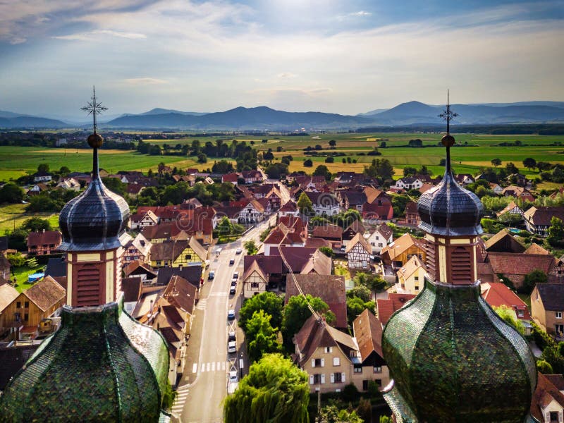 Soaring majestic church Saint Maurice in little french village E