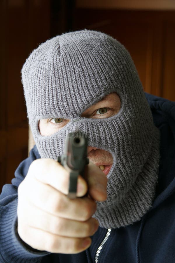 Sob a mira de arma foto de stock royalty free Sob a mira de arma foto de stock royalty free