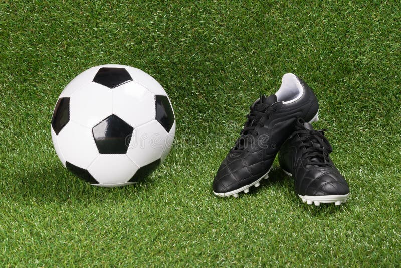 Soccer Ball and Boots on a Green Artificial Turf Stock Photo Image of professional, match
