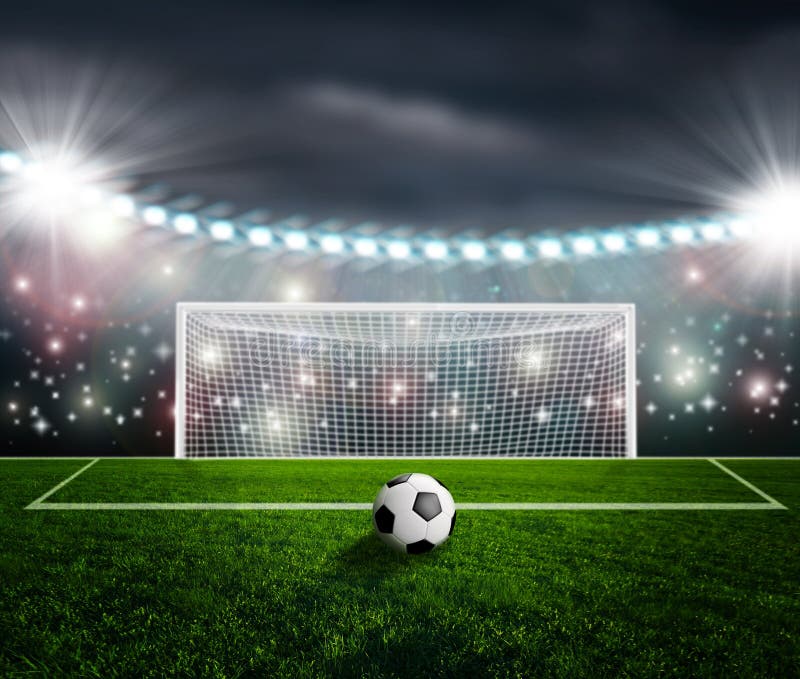 Soccer Ball on Green Field of Football Stadium for Background Stock