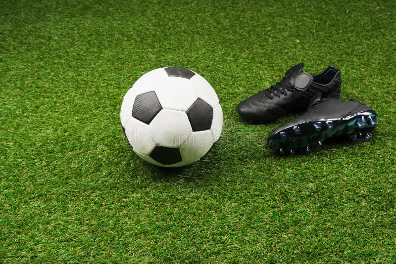 Soccer Ball with Pair of Black Boots on Grass Stock Photo Image of match, soccer 96459546
