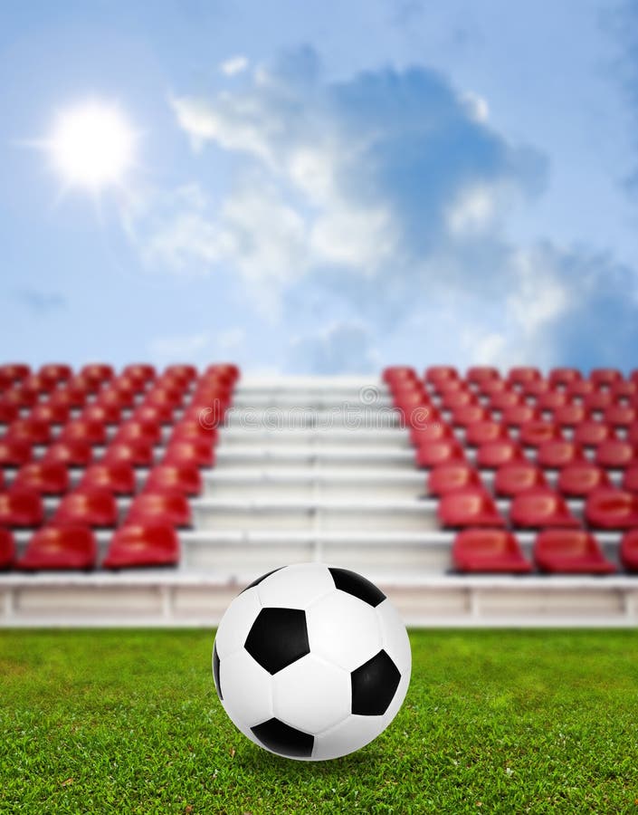 Soccer ball in sport arena with nice sky stock image Soccer ball in sport arena with nice sky stock image