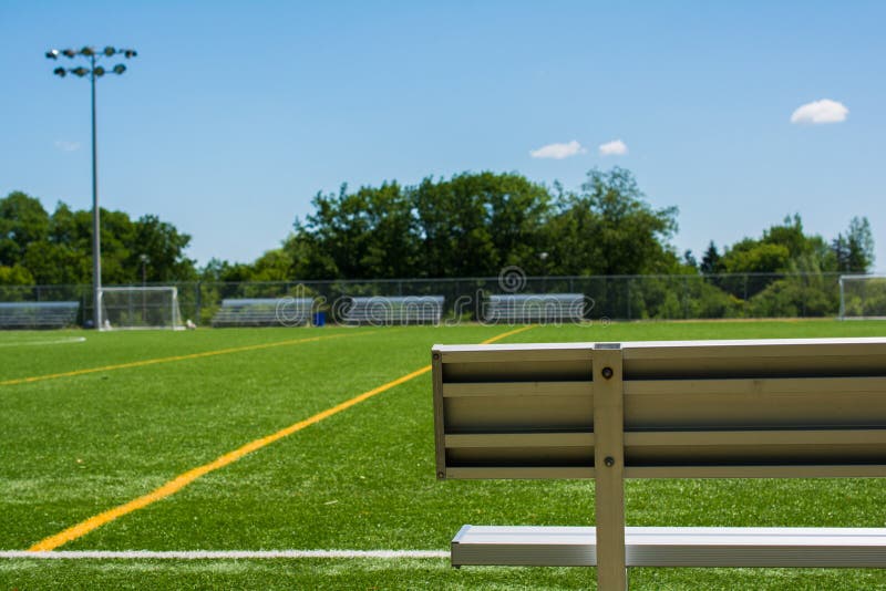Soccer Field with Bench on a Sunny Day Stock Image Image of sunlight