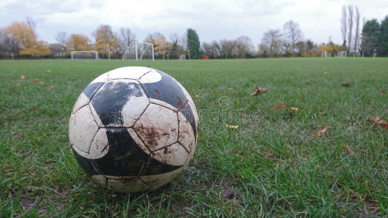 A close up of a football on the ground