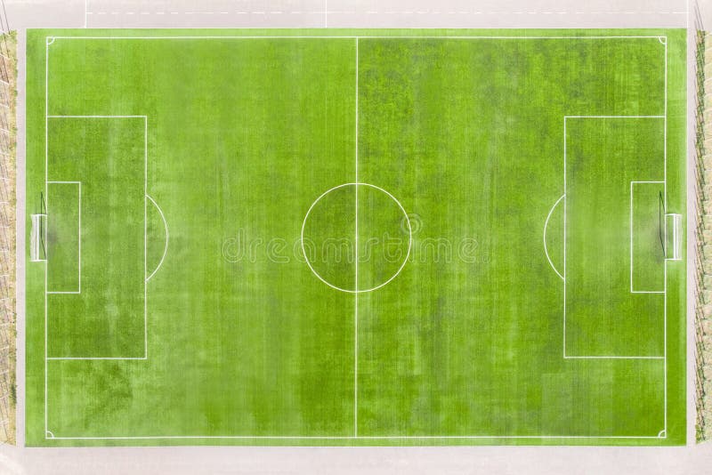 Soccer field with lines on grass. empty stadium without people. real football field aerial view