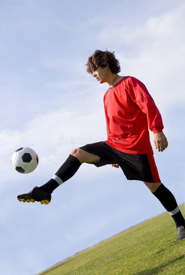 Soccer Football Player Juggling in Red Stock Photo Image of