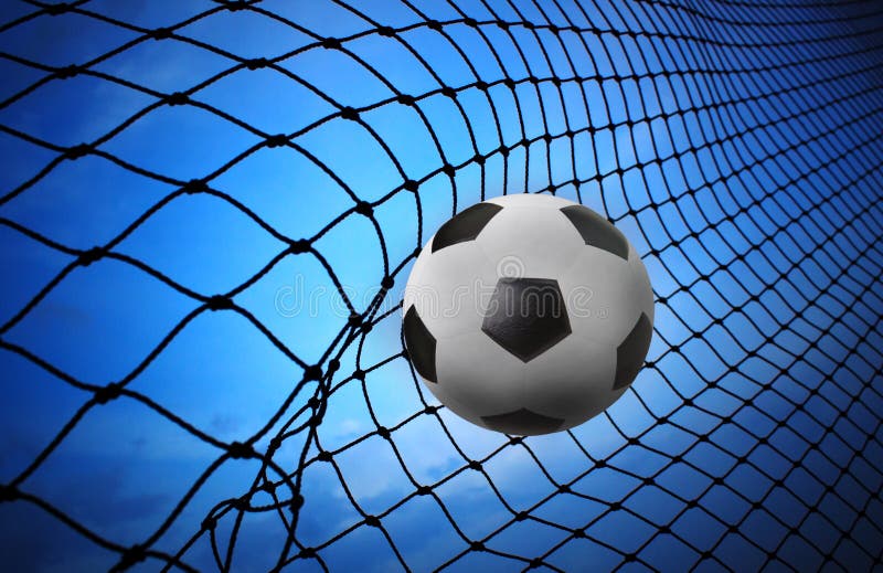 soccer football shoot into goal net