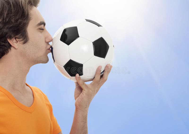 The soccer kiss the ball stock photography The soccer kiss the ball stock photography