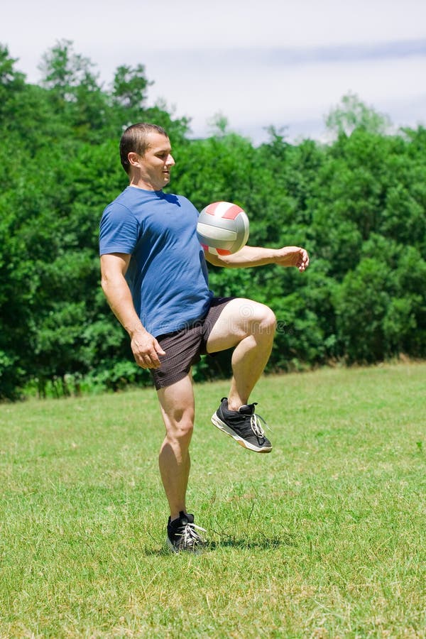 Soccer player kicking the ball