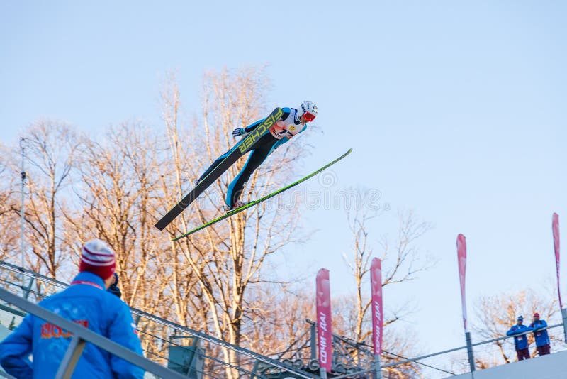 Ski jumping at the 2014 Winter Olympics was held at RusSki Gorki Jumping Center. Nordic skier flies from ski jump in air at World