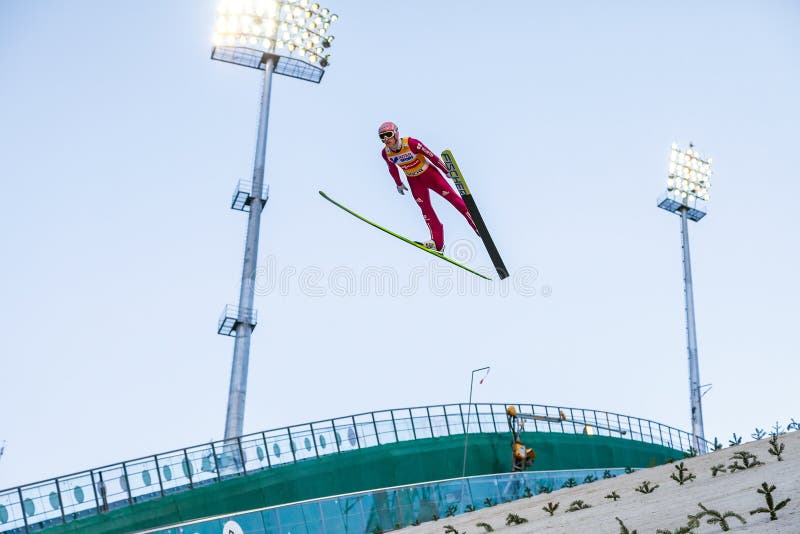 Ski jumping at the 2014 Winter Olympics was held at RusSki Gorki Jumping Center. Nordic skier flies from ski jump in air at World