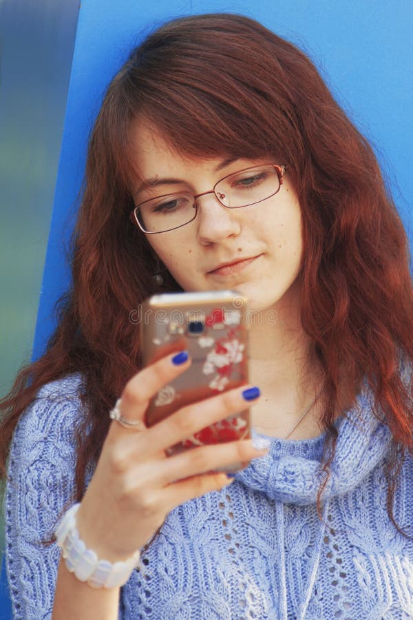 Social Media Addiction. Young Beautiful Woman Holding a Smartphone ...