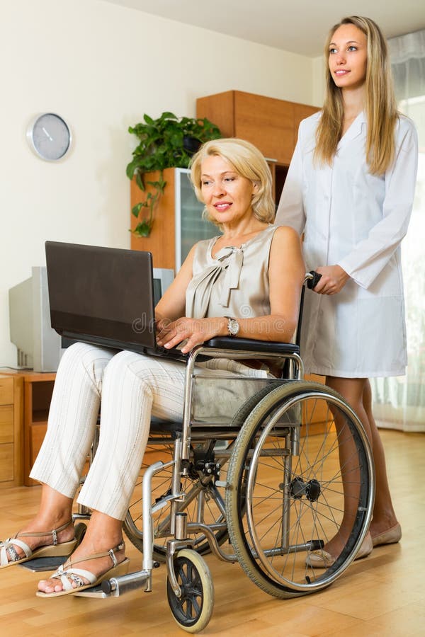 Social Worker And Invalid With Laptop Stock Image Image Of Paraplegic Guardianship 68715917