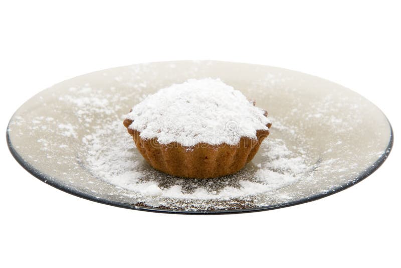 Small tasty cherry cake powdered with sugar on transparent black round plate isolated on white. Small tasty cherry cake powdered with sugar on transparent black round plate isolated on white