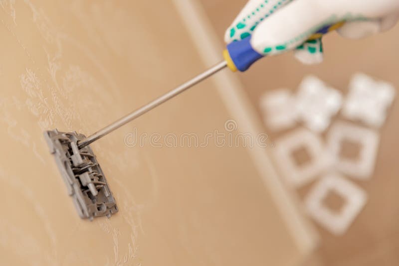 Sockets outlet install Electrician man builder working at home. Home electrician stock images, royalty-free photos and pictures