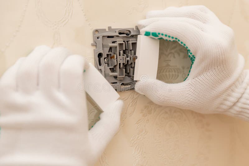 Sockets outlet install Electrician man builder working at home. Home electrician stock images, royalty-free photos and pictures
