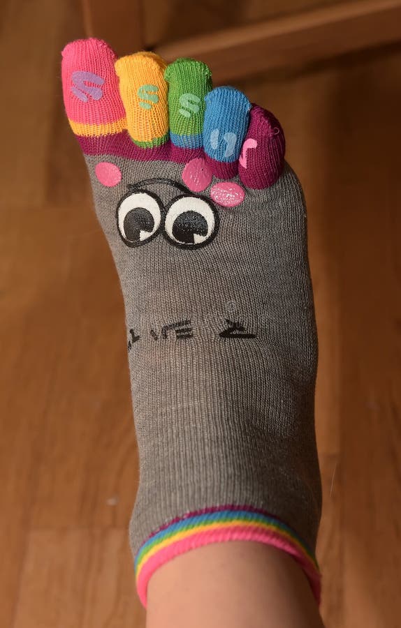 Fingers in color socks stock photo. Image of stocking 8120126