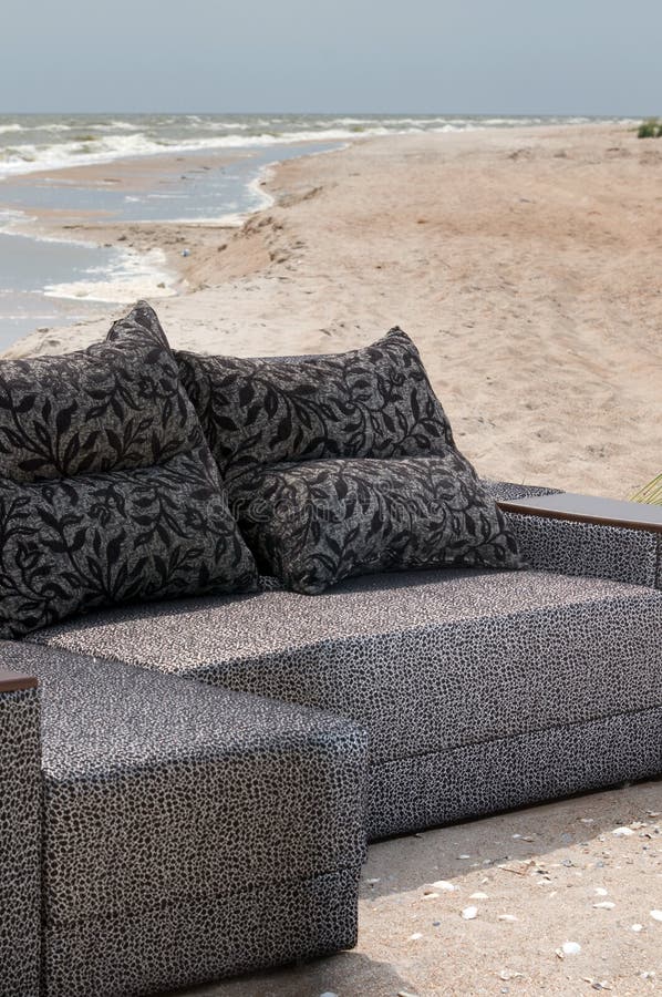 Sofa on the sea beach stock photo. Image of seascape 13090054