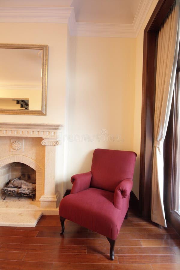 A sofa and fireplace in living room of an old lane house in shanghai. A sofa and fireplace in living room of an old lane house in shanghai