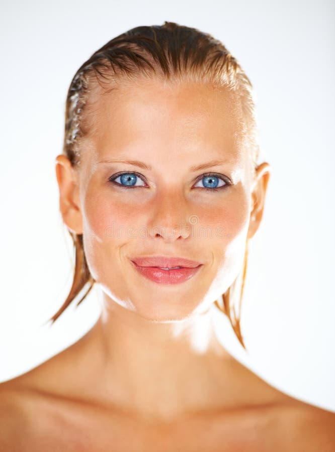 Soft And Beautiful Closeup Portrait Of A Pretty Young Woman Smirking With Cute Dimples Stock