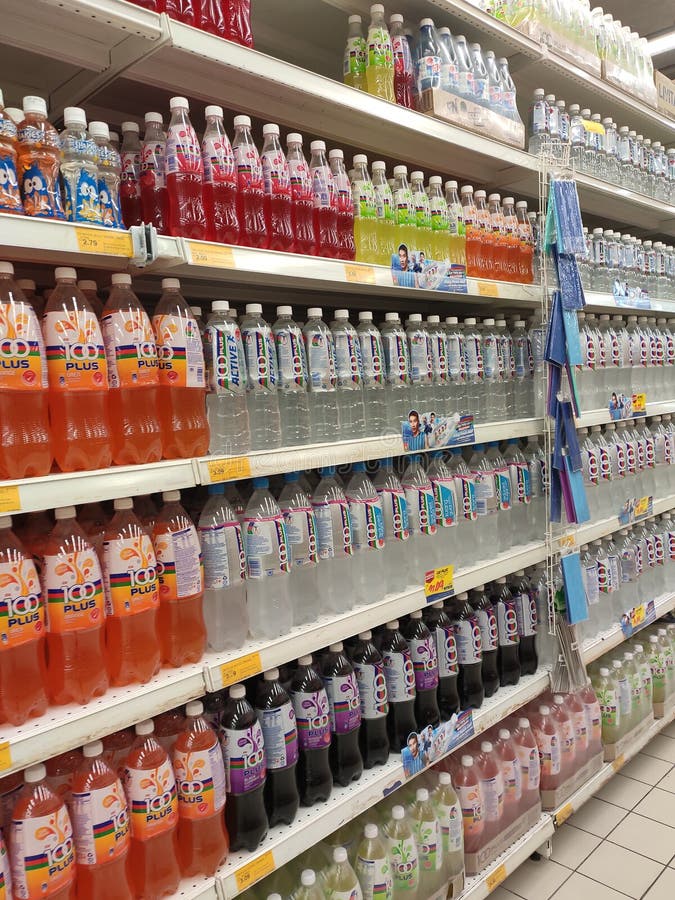 Soft Drinks or Carbonated Drinks Arranged and Stacked on the Rack ...