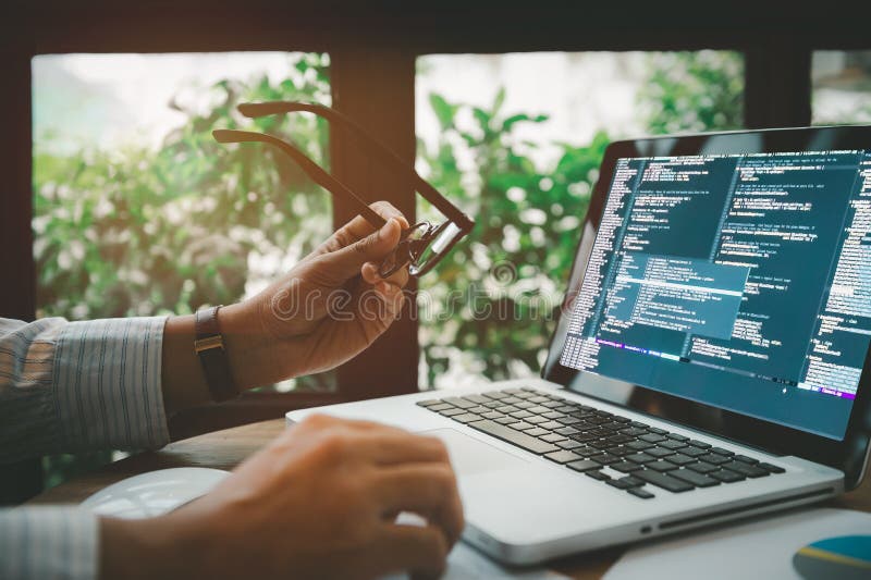 Soft focus blur of monitor with Developers of programming website design and Social Security cyberspace write coding technology stock images