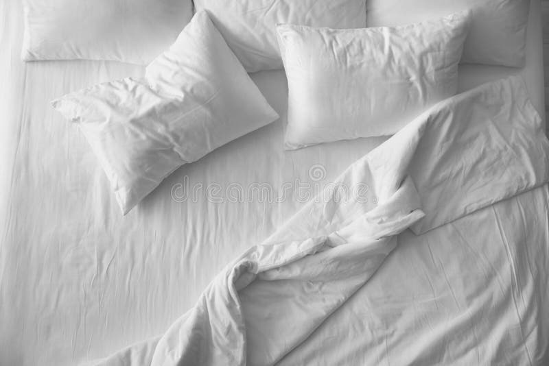 Soft pillows on comfortable bed