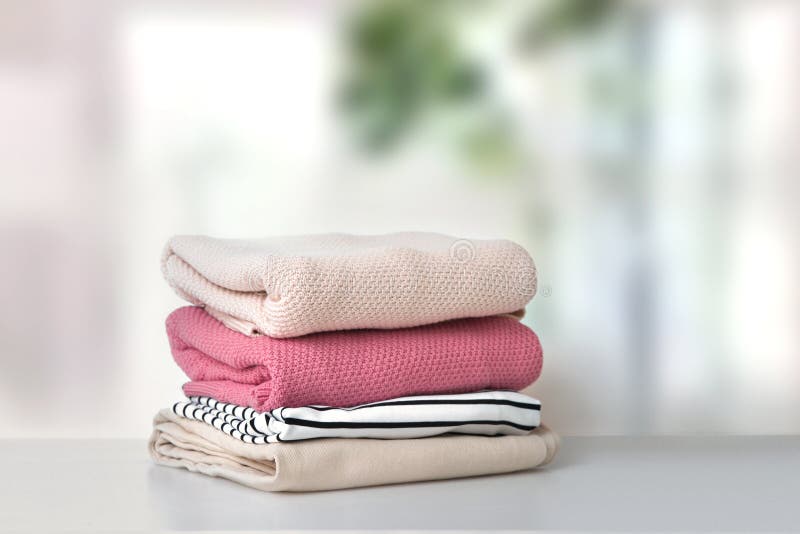 Soft Pink Stacked Knitted Clothing.Stack of Clothes Stock Image - Image ...