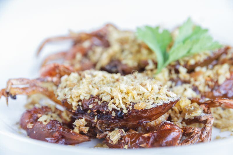 Soft shell crab fried with garlic stock photos